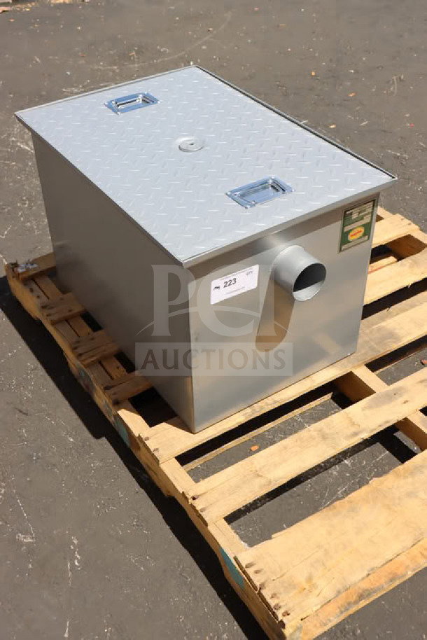 Regency 600GT25 50 lb. grease trap on pallet. Features 3" non-threaded connections; out of packaging with minor scratches.