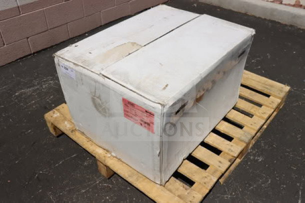 Brand new Endura 3935A03 grease trap in original packaging on pallet; 70 lb, 35 GPM, 3" hub, original labels visible.