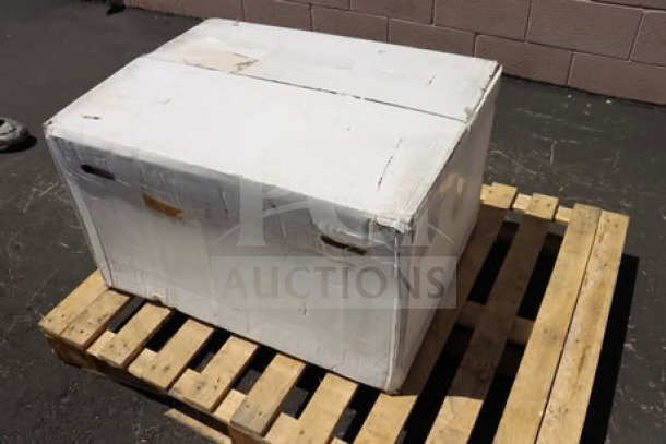 Boxed Endura 3935A03 70 lb. 35 GPM grease trap with 3" hub, in original packaging, on a wooden pallet.