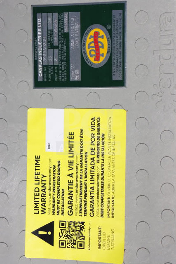 BRAND NEW Endura 3935A03 grease trap, 70 lb. capacity, 35 GPM, 3" hub, in original packaging. Warranty label visible.