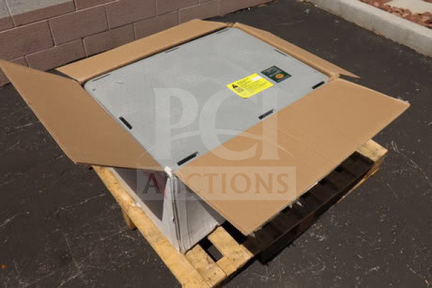 Brand new Endura 3935A03 70 lb. grease trap, 35 GPM, 3" hub, in original packaging on a pallet. Labels visible.