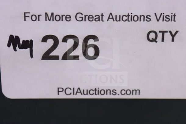 "Label with auction information, item number 226, and URL PClAuctions.com."