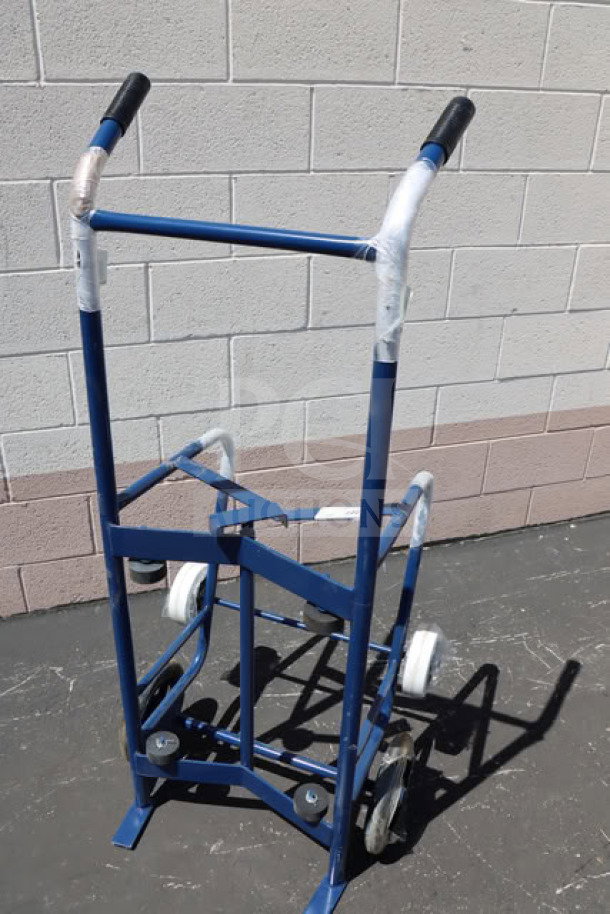 BRAND NEW Lavex 257HT0063 steel drum hand truck with 900 lb. capacity, two 10" iron and two 6" rubber wheels, un-boxed.
