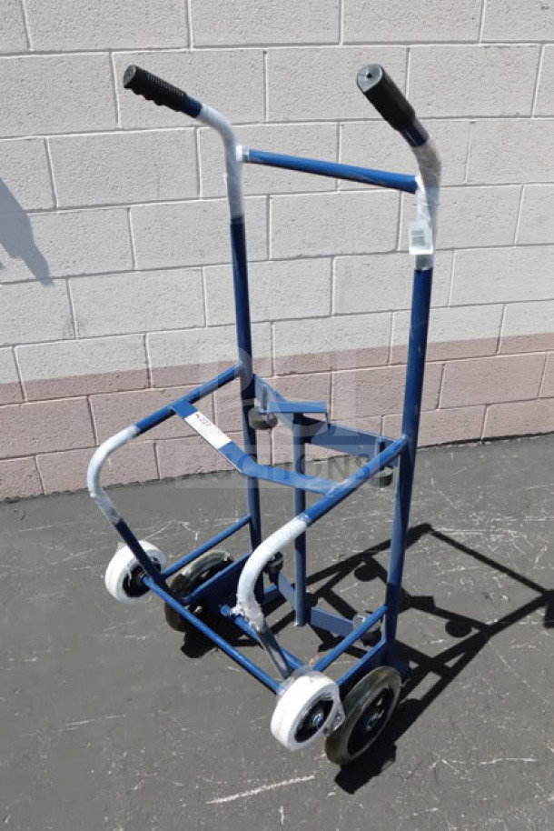 Brand new Lavex 257HT0063 steel drum hand truck with 10" iron and 6" rubber wheels, unboxed, excellent condition.