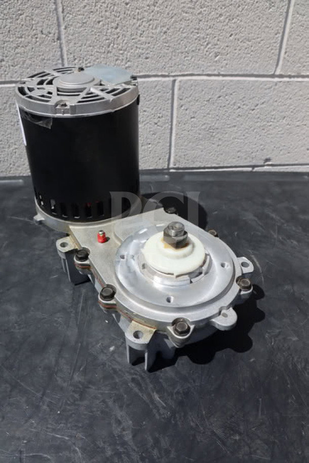 Brand new Scotsman A33220-021 gear reducer and motor, compatible with 78 models, slight scratches visible.