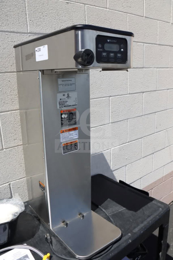 Brand new Bunn 53100.0101 BrewWISE ICB-DV coffee brewer, stainless steel, dual voltage, with control panel and labels visible.