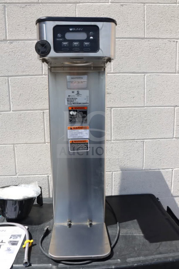 Bunn BrewWISE ICB-DV Tall Infusion Series coffee brewer, stainless steel, dual voltage, new with visible warning labels.