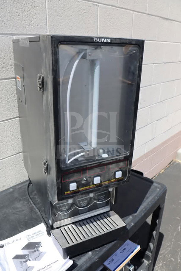 Brand new Bunn FMD-3 cappuccino machine, 3 hoppers, model SET00.0197, scratch-n-dent, missing graphic, 120V. Serial #FMD0137312.