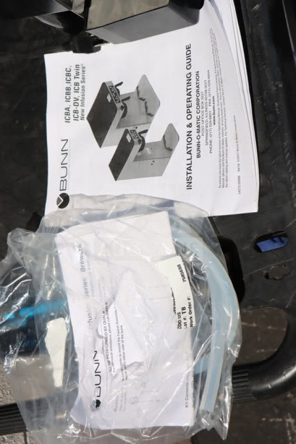 Bunn FMD-3 espresso machine, model SET00.0197, new scratch-n-dent, includes installation guide, missing graphic.