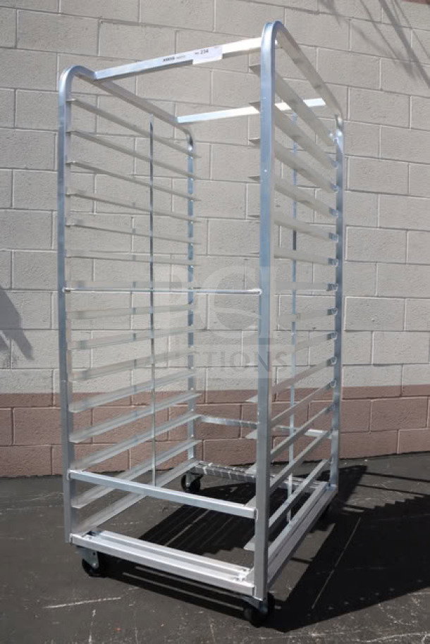 Brand new Channel 412A-DOR double section side load aluminum bun pan oven rack, holds 30 pans, slight scratches, durable.