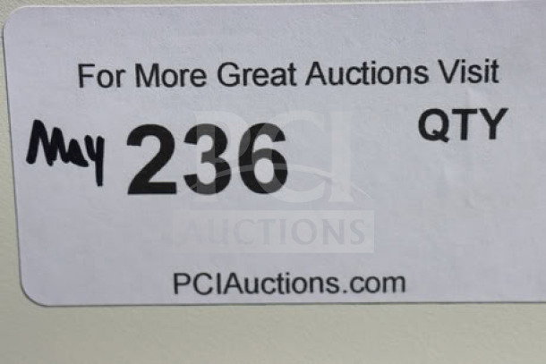 Auction tag showing lot number 236 for a PCI Auctions listing.