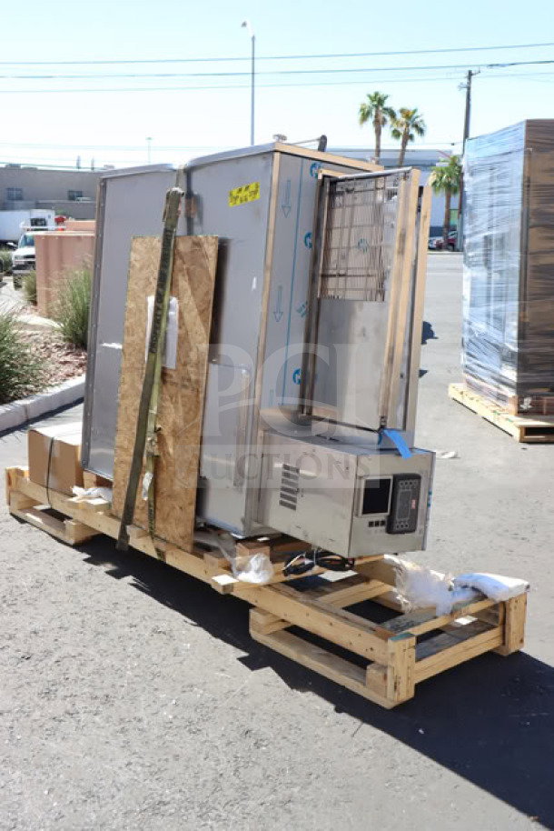 Brand new XLT 3255 H Series conveyor oven, 32" wide, 55" long chamber, on pallet, with visible control panel and packaging.