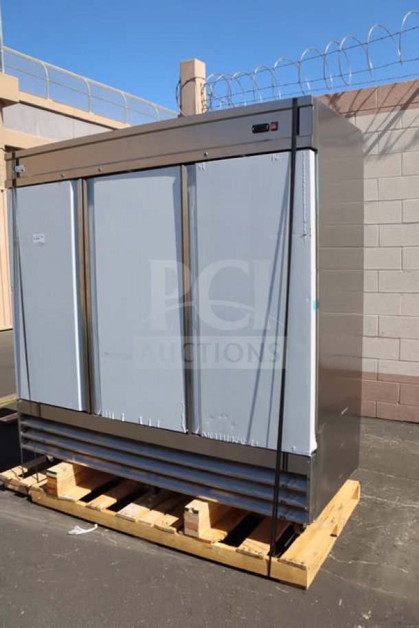 Brand new Avantco SS-3F-HC stainless steel reach-in freezer, slight scratches and dents, three solid doors, on pallet.