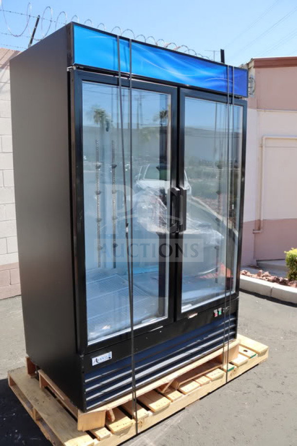 Avantco GDC-49-HC 53" black swing glass door merchandiser refrigerator, LED lighting, minor scratches, on wooden pallet.