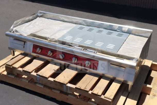 Avantco EG60E 60" electric countertop griddle, brand new, scratch-n-dent, 240V, 17,500W, on a wooden pallet. Serial #EG60E25090005.