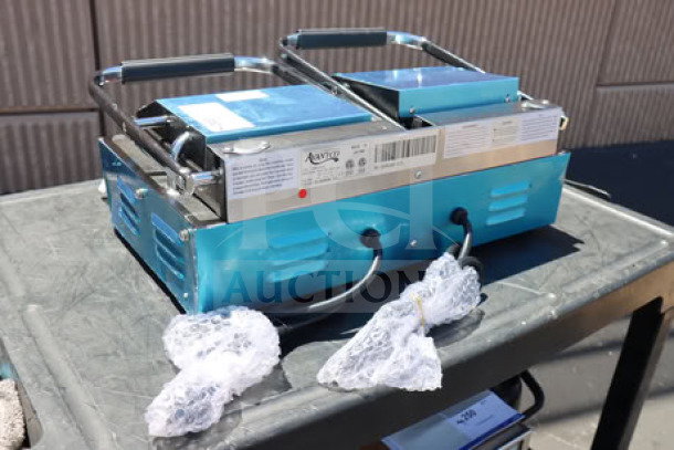 Avantco PG400GS commercial dual panini grill, grooved top, smooth bottom, 19 5/8" x 9 1/8" surface, 120V, 3500W, new condition.