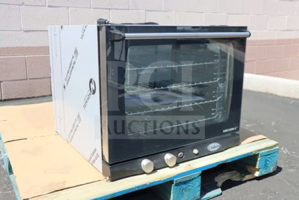 Cadco Arianna XAF-133 convection oven, brand new, 4 shelves, half-size, manual controls, on pallet, serial #202510095996.