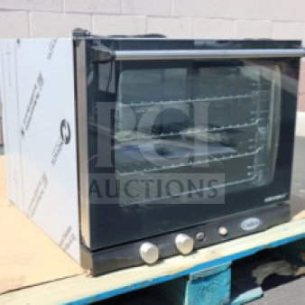 Cadco Arianna XAF-133 convection oven, brand new, 4 shelves, half-size, manual controls, on pallet, serial #202510095996.