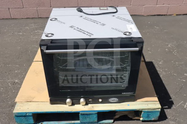 Brand new Cadco Arianna XAF-133 convection oven, 4-shelf, half-size, manual, 208-240V, on pallet. Serial #202510095996.
