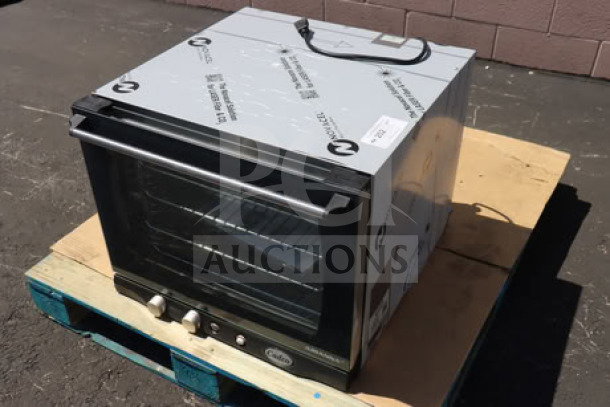 Brand new Cadco Arianna XAF-133 heavy-duty convection oven, 4-shelf, half size, manual controls, 208-240V, unboxed.