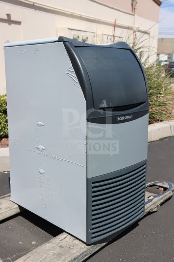 BRAND NEW SCRATCH-N-DENT Scotsman UF1415AX-1A flake ice machine, 15" air-cooled, 36 lb bin, visible exterior dents.