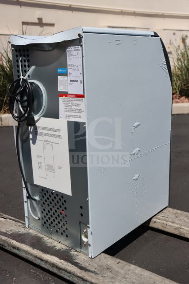 BRAND NEW Scotsman UF1415AX-1A 15" air-cooled undercounter flake ice machine. Scratch-n-dent condition. 115 volts. Serial #25061320016340.