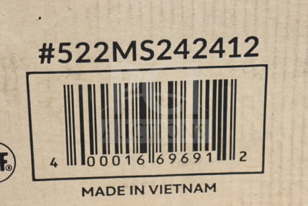 Steelton mop sink, model 522MS242412, barcode shown, "Made in Vietnam" text on damaged packaging.