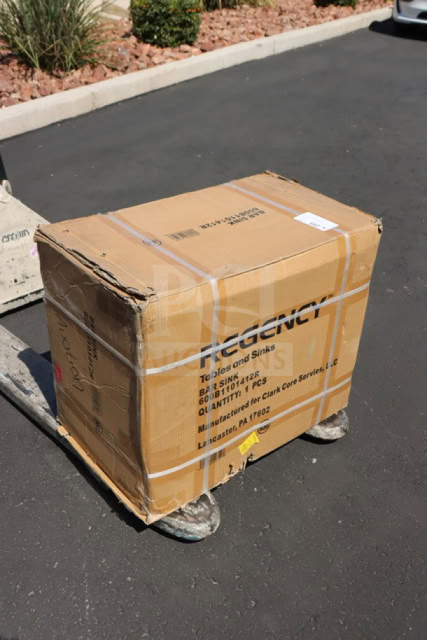 Boxed Regency 24" x 18 3/4" one bowl underbar sink with right drainboard, model 600B1101412R, new condition.