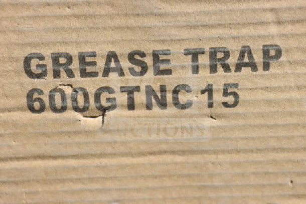 Regency 600GTNC15 grease trap packaging with visible label; packaging is damaged.