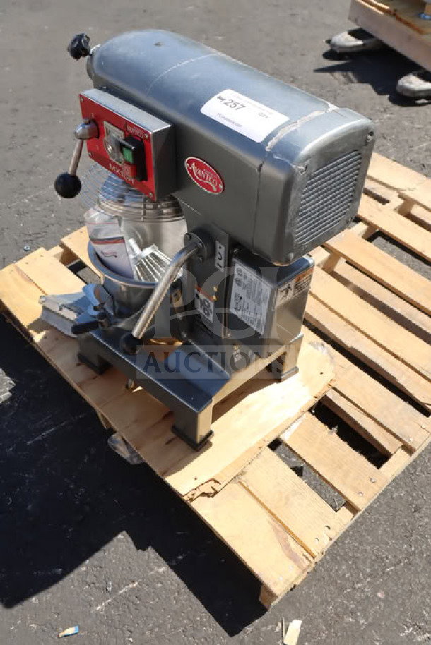 Brand new Avantco MX10H 10 Qt. planetary stand mixer with guard on a pallet. Includes standard accessories. Scratch-n-dent condition.