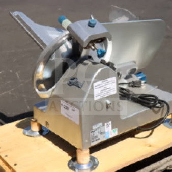 Brand new Edlund EDV-12 12" manual meat slicer, 1/2 hp, 115 volts, minor scratches, out of original packaging.