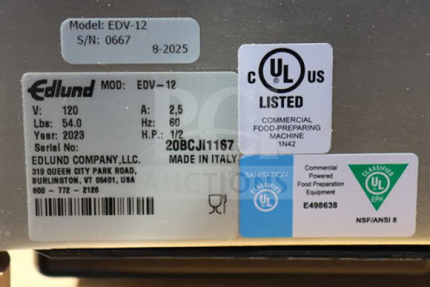 Edlund EDV-12 12" Manual Meat Slicer, 1/2 hp, 115V, with visible model and serial number labels. Signs of wear.