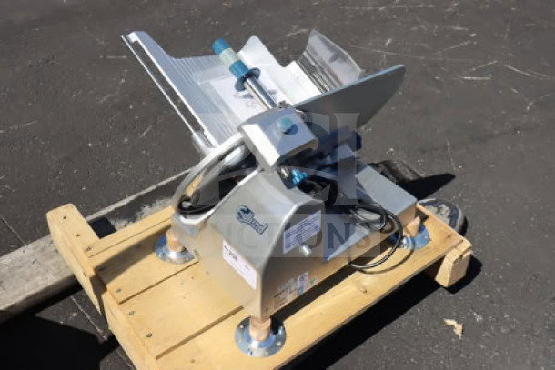 Edlund EDV-12 12" manual meat slicer, new, medium-duty, 1/2 hp, 115V 1 phase. Out of packaging; minor scratches/dents.