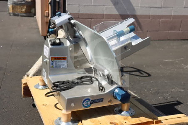 Edlund EDV-12 12" medium-duty manual meat slicer, 1/2 hp, brand new, minor scratches and dents, serial #20BCJI1167.