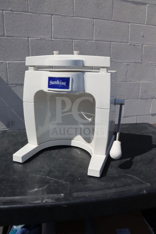 Sunkist S-100 Commercial Sectionizer, white, no attachments, visible Sunkist logo, good condition, sturdy handle.