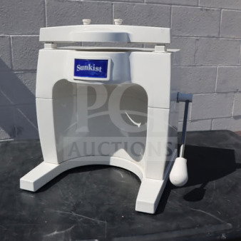 Sunkist S-100 Commercial Sectionizer, white, no attachments, visible Sunkist logo, good condition, sturdy handle.