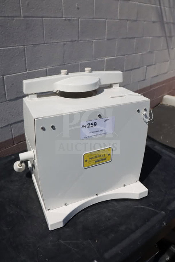 Sunkist S-100 Commercial Sectionizer in white. No attachments included. Slightly used condition. Sunkist label visible.