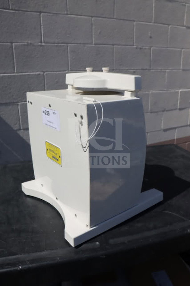 Sunkist S-100 Commercial Sectionizer, no attachments, white, model label visible. Appears in good condition for auction.