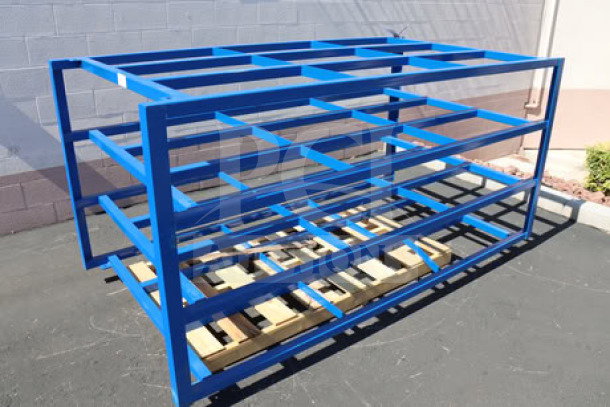 BRAND NEW Vestil steel sheet material rack, model SHEET-R-57-HB-1, 4-shelf, 2,000 lb capacity, broken weld on bottom rack.