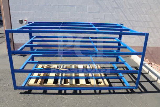 Brand new Vestil 4-shelf steel rack, model SHEET-R-57-HB-1, 2,000 lb. capacity; one bottom rack weld broken.