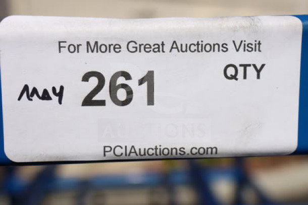 "261" auction label on blue surface, includes "For More Great Auctions Visit PCIAuctions.com" and handwritten "May".