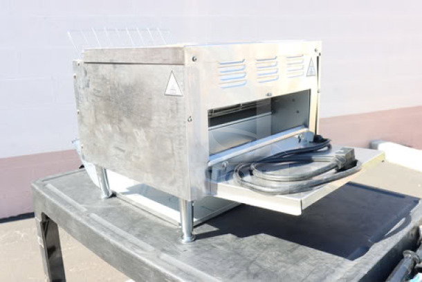 Brand new Avantco T3600B conveyor toaster, 14.5" wide, 208V, 3600W, 1200 slices/hour, bent prong on cord, serial no. 5002725184T3600B.