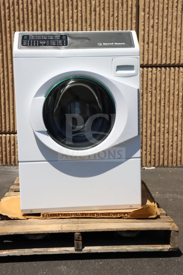 Brand new Speed Queen FF7012WN 3.5 cu. ft. front load washer, right hinged, front control, on a pallet.