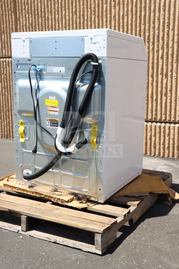 Brand new Speed Queen FF7012WN front load washer, 3.5 cu. ft., right hinge, minor scratches, on pallet.