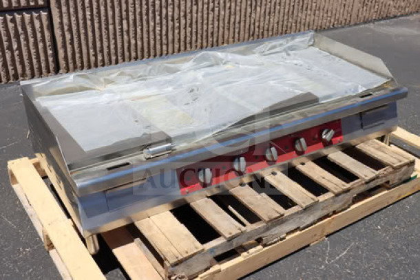 Brand new Avantco EG60E 60" electric countertop griddle, 240V, 17,500W, with minor scratches, missing middle leg, on pallet.