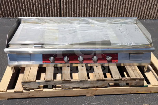 Avantco EG60E 60" electric griddle, 240V, 17,500W, new condition, missing middle leg, on pallet, serial EG80E25110004.