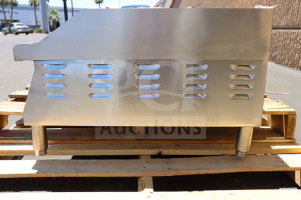 Brand new Avantco EG60E 60" electric countertop griddle, 240V, 17,500W, missing a middle leg, visible side vents.