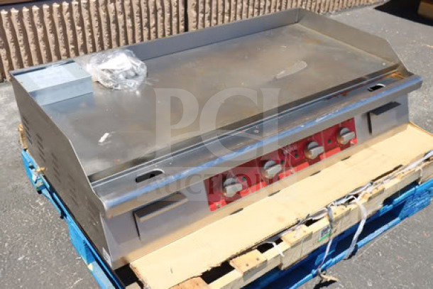 Avantco EG48N 48" electric countertop griddle, stainless steel, four control knobs, 208/240V, on pallet, used condition.