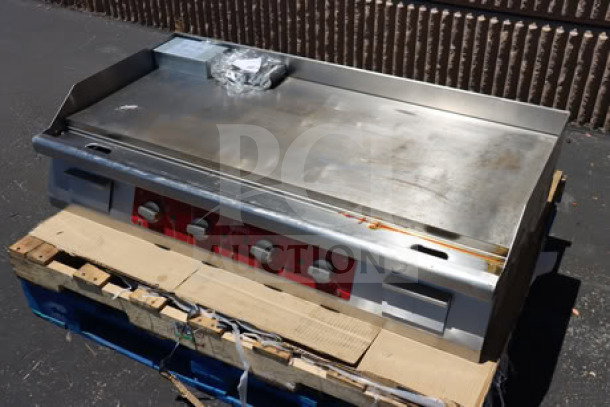 Avantco EG48N 48" electric countertop griddle, stainless steel, 208/240V, used condition, on wooden pallet.