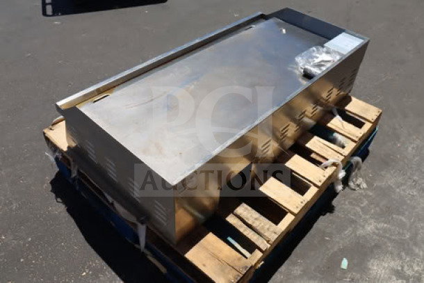 Avantco EG48N 48" electric countertop griddle, stainless steel, 208/240V, 10482W-14000W, shown on pallet, unused condition.
